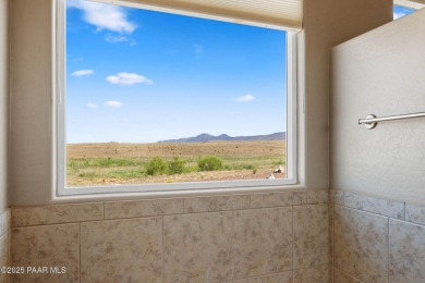 Views, views, views!! This home is nestled between the Quailwood on Quail Wood Greens Golf Course in Arizona - for sale on GolfHomes.com, golf home, golf lot