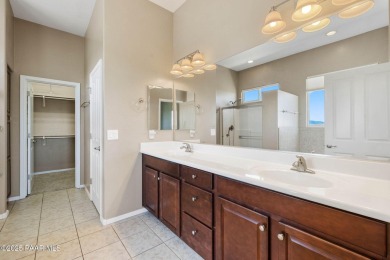 Views, views, views!! This home is nestled between the Quailwood on Quail Wood Greens Golf Course in Arizona - for sale on GolfHomes.com, golf home, golf lot