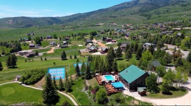 Escape to your own slice of Paradise at Bear Lake with this on Bear Lake West Golf and Country Club in Idaho - for sale on GolfHomes.com, golf home, golf lot