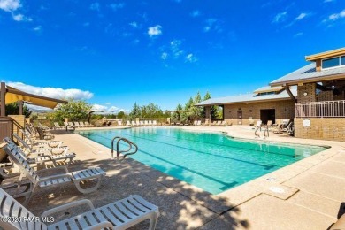 Views, views, views!! This home is nestled between the Quailwood on Quail Wood Greens Golf Course in Arizona - for sale on GolfHomes.com, golf home, golf lot