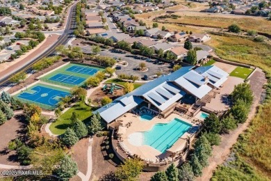 This Quailwood home boasts incredible views, nestled between the on Quail Wood Greens Golf Course in Arizona - for sale on GolfHomes.com, golf home, golf lot
