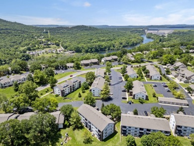 Welcome to your fully furnished two-bedroom, two-bathroom on Pointe Royale Village Country Club in Missouri - for sale on GolfHomes.com, golf home, golf lot