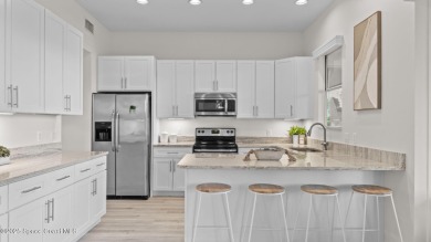 Discover Waterfront Living in the coveted Savannahs Golf Course on Savannahs Golf Club in Florida - for sale on GolfHomes.com, golf home, golf lot