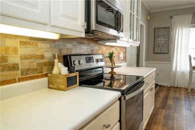 Welcome to this stunning 2,239 sq ft, 3-bedroom, 2-bath brick on Lakeview Golf and Country Club in Georgia - for sale on GolfHomes.com, golf home, golf lot