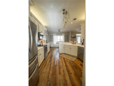 Welcome to this stunning 2,239 sq ft, 3-bedroom, 2-bath brick on Lakeview Golf and Country Club in Georgia - for sale on GolfHomes.com, golf home, golf lot
