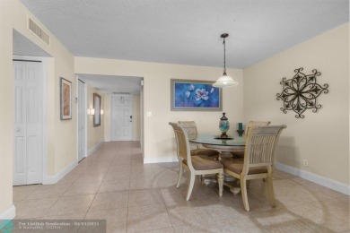 Enjoy a Serene Lake View from this Super Clean, Bright 2nd Floor on Palm-Aire Country Club and Resort - Palms in Florida - for sale on GolfHomes.com, golf home, golf lot