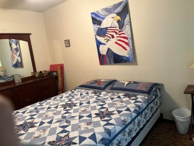 Located near Greenbelt Lake, a golf course, and a highly on Clarendon Country Club in Texas - for sale on GolfHomes.com, golf home, golf lot