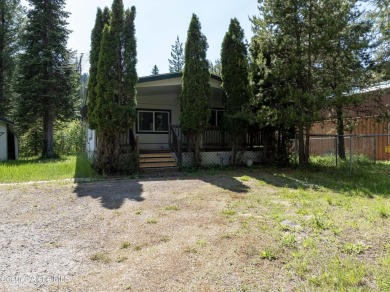 Located on a quiet half-acre lot with 100 feet of Lamb Creek on Priest Lake Golf and Tennis Club in Idaho - for sale on GolfHomes.com, golf home, golf lot