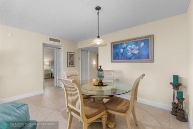 Enjoy a Serene Lake View from this Super Clean, Bright 2nd Floor on Palm-Aire Country Club and Resort - Palms in Florida - for sale on GolfHomes.com, golf home, golf lot