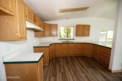 Located on a quiet half-acre lot with 100 feet of Lamb Creek on Priest Lake Golf and Tennis Club in Idaho - for sale on GolfHomes.com, golf home, golf lot
