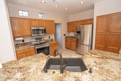 Located in the beautiful Verde Santa Fe community this house on Verde Santa Fe Golf Club in Arizona - for sale on GolfHomes.com, golf home, golf lot