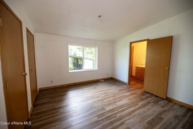 Located on a quiet half-acre lot with 100 feet of Lamb Creek on Priest Lake Golf and Tennis Club in Idaho - for sale on GolfHomes.com, golf home, golf lot