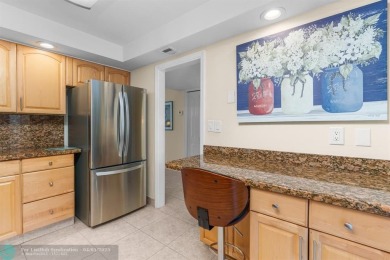 Enjoy a Serene Lake View from this Super Clean, Bright 2nd Floor on Palm-Aire Country Club and Resort - Palms in Florida - for sale on GolfHomes.com, golf home, golf lot