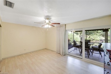 Nestled within the gated community of Spanish Wells in Bonita on Spanish Wells Golf and Country Club in Florida - for sale on GolfHomes.com, golf home, golf lot