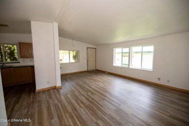 Located on a quiet half-acre lot with 100 feet of Lamb Creek on Priest Lake Golf and Tennis Club in Idaho - for sale on GolfHomes.com, golf home, golf lot