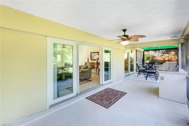 Nestled within the gated community of Spanish Wells in Bonita on Spanish Wells Golf and Country Club in Florida - for sale on GolfHomes.com, golf home, golf lot