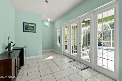 Welcome to this beautifully maintained 4-bedroom, 2-bathroom on Plantation Bay Golf and Country Club in Florida - for sale on GolfHomes.com, golf home, golf lot