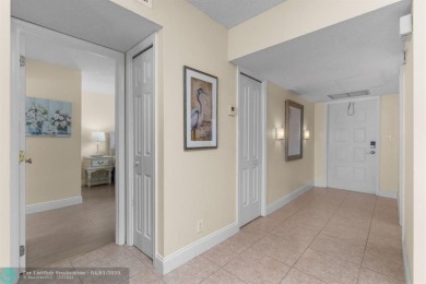 Enjoy a Serene Lake View from this Super Clean, Bright 2nd Floor on Palm-Aire Country Club and Resort - Palms in Florida - for sale on GolfHomes.com, golf home, golf lot