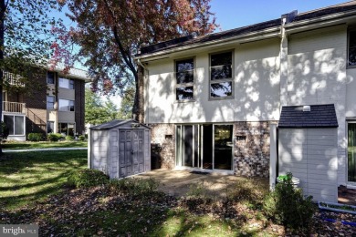 This coveted brick end-unit townhouse with two bedrooms, one on Leisure World Golf Club in Maryland - for sale on GolfHomes.com, golf home, golf lot