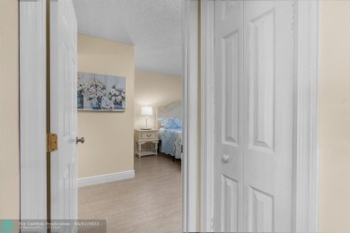 Enjoy a Serene Lake View from this Super Clean, Bright 2nd Floor on Palm-Aire Country Club and Resort - Palms in Florida - for sale on GolfHomes.com, golf home, golf lot