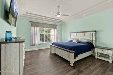 Welcome to this beautifully maintained 4-bedroom, 2-bathroom on Plantation Bay Golf and Country Club in Florida - for sale on GolfHomes.com, golf home, golf lot