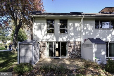 This coveted brick end-unit townhouse with two bedrooms, one on Leisure World Golf Club in Maryland - for sale on GolfHomes.com, golf home, golf lot