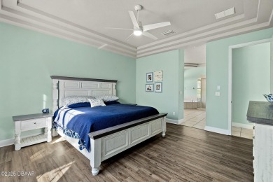 Welcome to this beautifully maintained 4-bedroom, 2-bathroom on Plantation Bay Golf and Country Club in Florida - for sale on GolfHomes.com, golf home, golf lot
