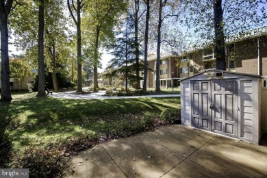 This coveted brick end-unit townhouse with two bedrooms, one on Leisure World Golf Club in Maryland - for sale on GolfHomes.com, golf home, golf lot