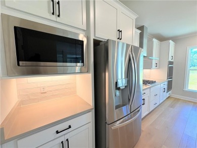 Discover the perfect blend of comfort, space, and style in the on The Golf Club At Sanctuary Cove in Georgia - for sale on GolfHomes.com, golf home, golf lot