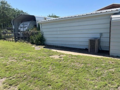 Located near Greenbelt Lake, a golf course, and a highly on Clarendon Country Club in Texas - for sale on GolfHomes.com, golf home, golf lot