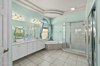 Welcome to this beautifully maintained 4-bedroom, 2-bathroom on Plantation Bay Golf and Country Club in Florida - for sale on GolfHomes.com, golf home, golf lot