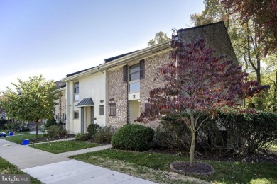 This coveted brick end-unit townhouse with two bedrooms, one on Leisure World Golf Club in Maryland - for sale on GolfHomes.com, golf home, golf lot