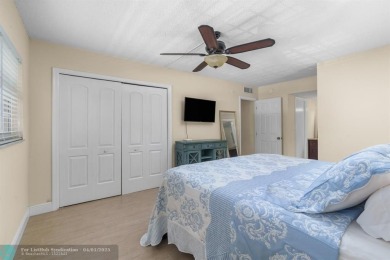 Enjoy a Serene Lake View from this Super Clean, Bright 2nd Floor on Palm-Aire Country Club and Resort - Palms in Florida - for sale on GolfHomes.com, golf home, golf lot