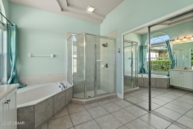 Welcome to this beautifully maintained 4-bedroom, 2-bathroom on Plantation Bay Golf and Country Club in Florida - for sale on GolfHomes.com, golf home, golf lot