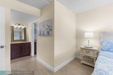 Enjoy a Serene Lake View from this Super Clean, Bright 2nd Floor on Palm-Aire Country Club and Resort - Palms in Florida - for sale on GolfHomes.com, golf home, golf lot