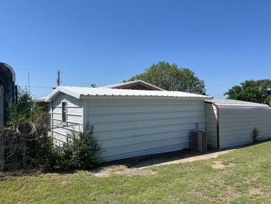 Located near Greenbelt Lake, a golf course, and a highly on Clarendon Country Club in Texas - for sale on GolfHomes.com, golf home, golf lot