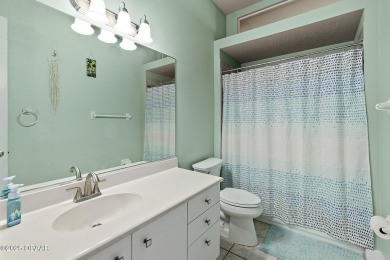 Welcome to this beautifully maintained 4-bedroom, 2-bathroom on Plantation Bay Golf and Country Club in Florida - for sale on GolfHomes.com, golf home, golf lot