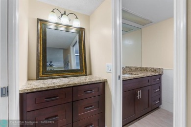 Enjoy a Serene Lake View from this Super Clean, Bright 2nd Floor on Palm-Aire Country Club and Resort - Palms in Florida - for sale on GolfHomes.com, golf home, golf lot