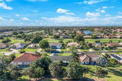 Nestled within the gated community of Spanish Wells in Bonita on Spanish Wells Golf and Country Club in Florida - for sale on GolfHomes.com, golf home, golf lot