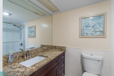 Enjoy a Serene Lake View from this Super Clean, Bright 2nd Floor on Palm-Aire Country Club and Resort - Palms in Florida - for sale on GolfHomes.com, golf home, golf lot