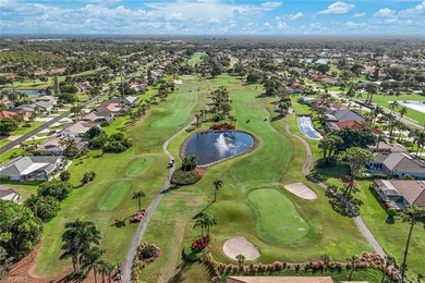 Nestled within the gated community of Spanish Wells in Bonita on Spanish Wells Golf and Country Club in Florida - for sale on GolfHomes.com, golf home, golf lot