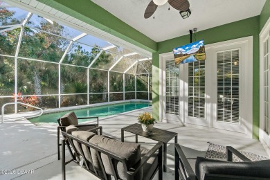 Welcome to this beautifully maintained 4-bedroom, 2-bathroom on Plantation Bay Golf and Country Club in Florida - for sale on GolfHomes.com, golf home, golf lot