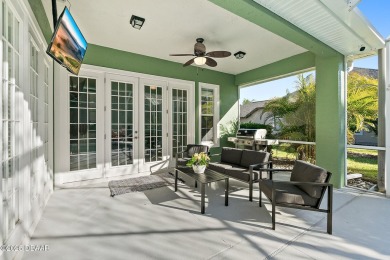 Welcome to this beautifully maintained 4-bedroom, 2-bathroom on Plantation Bay Golf and Country Club in Florida - for sale on GolfHomes.com, golf home, golf lot