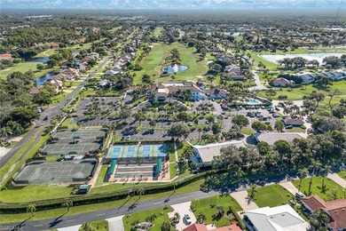 Nestled within the gated community of Spanish Wells in Bonita on Spanish Wells Golf and Country Club in Florida - for sale on GolfHomes.com, golf home, golf lot