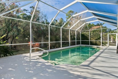 Welcome to this beautifully maintained 4-bedroom, 2-bathroom on Plantation Bay Golf and Country Club in Florida - for sale on GolfHomes.com, golf home, golf lot