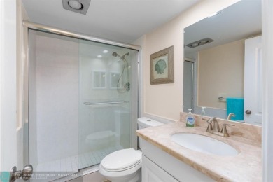 Enjoy a Serene Lake View from this Super Clean, Bright 2nd Floor on Palm-Aire Country Club and Resort - Palms in Florida - for sale on GolfHomes.com, golf home, golf lot
