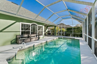 Welcome to this beautifully maintained 4-bedroom, 2-bathroom on Plantation Bay Golf and Country Club in Florida - for sale on GolfHomes.com, golf home, golf lot