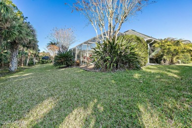 Welcome to this beautifully maintained 4-bedroom, 2-bathroom on Plantation Bay Golf and Country Club in Florida - for sale on GolfHomes.com, golf home, golf lot