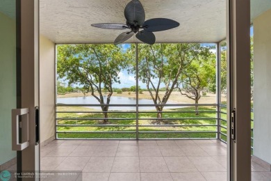 Enjoy a Serene Lake View from this Super Clean, Bright 2nd Floor on Palm-Aire Country Club and Resort - Palms in Florida - for sale on GolfHomes.com, golf home, golf lot