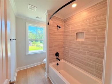 Discover the perfect blend of comfort, space, and style in the on The Golf Club At Sanctuary Cove in Georgia - for sale on GolfHomes.com, golf home, golf lot